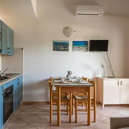 Isa-apartments With Air Conditioning And External Outdoor Space In Budoni, At Only 300 M From The Apartmanhotel 3*